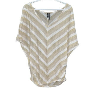 Guess size Medium. Gold and white stripped top, cinched sides